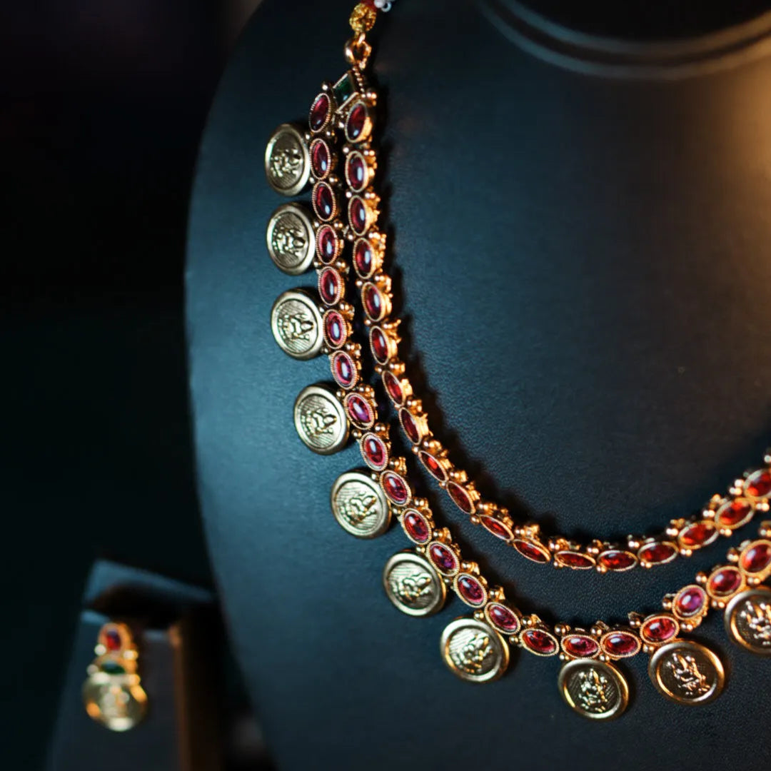 Necklace with decorative elements on a dark background